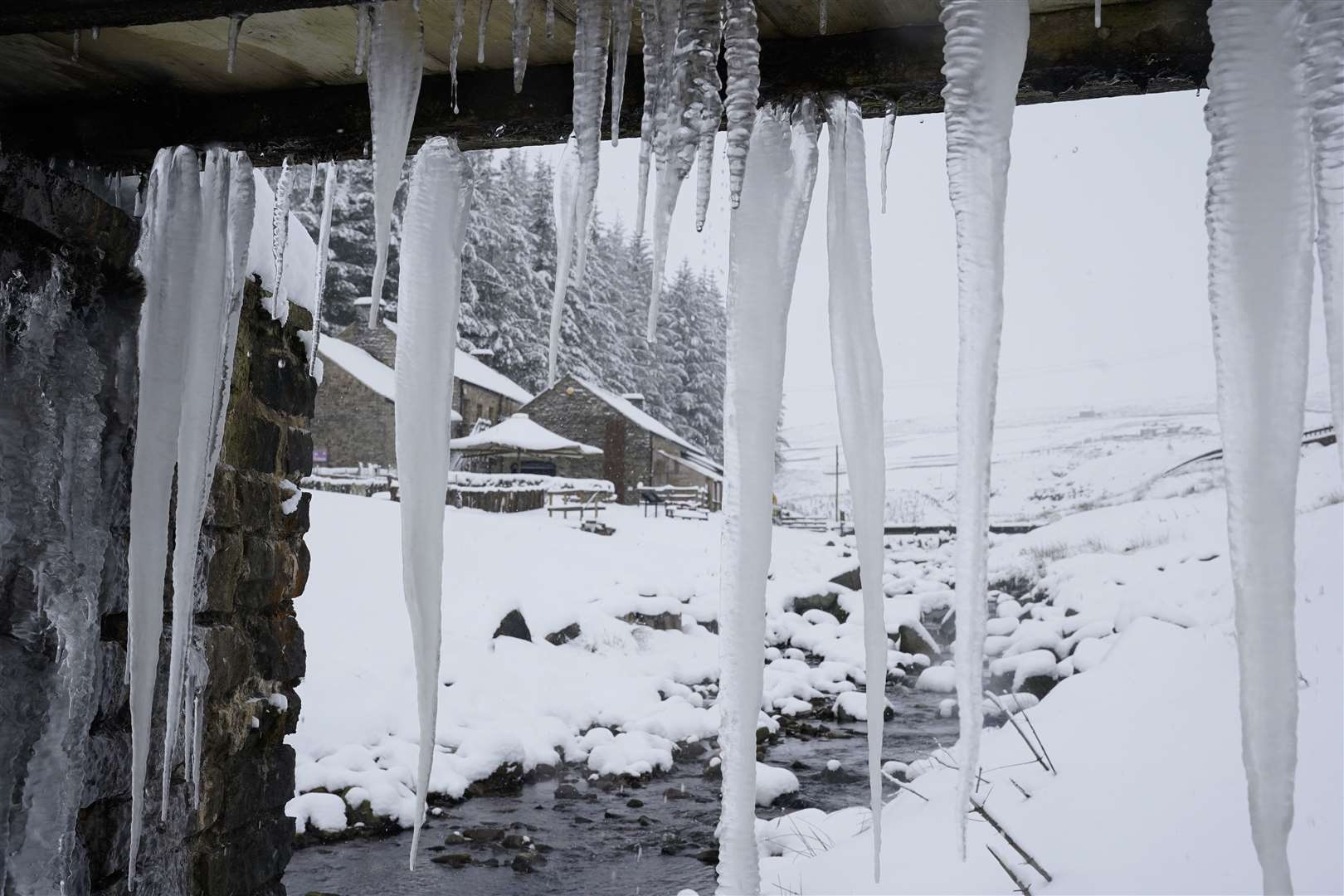 Icicles hang from a wooden bridge at Killhope Lead Mining Museum in the North Pennines, Northumberland (Owen Humphreys/PA)