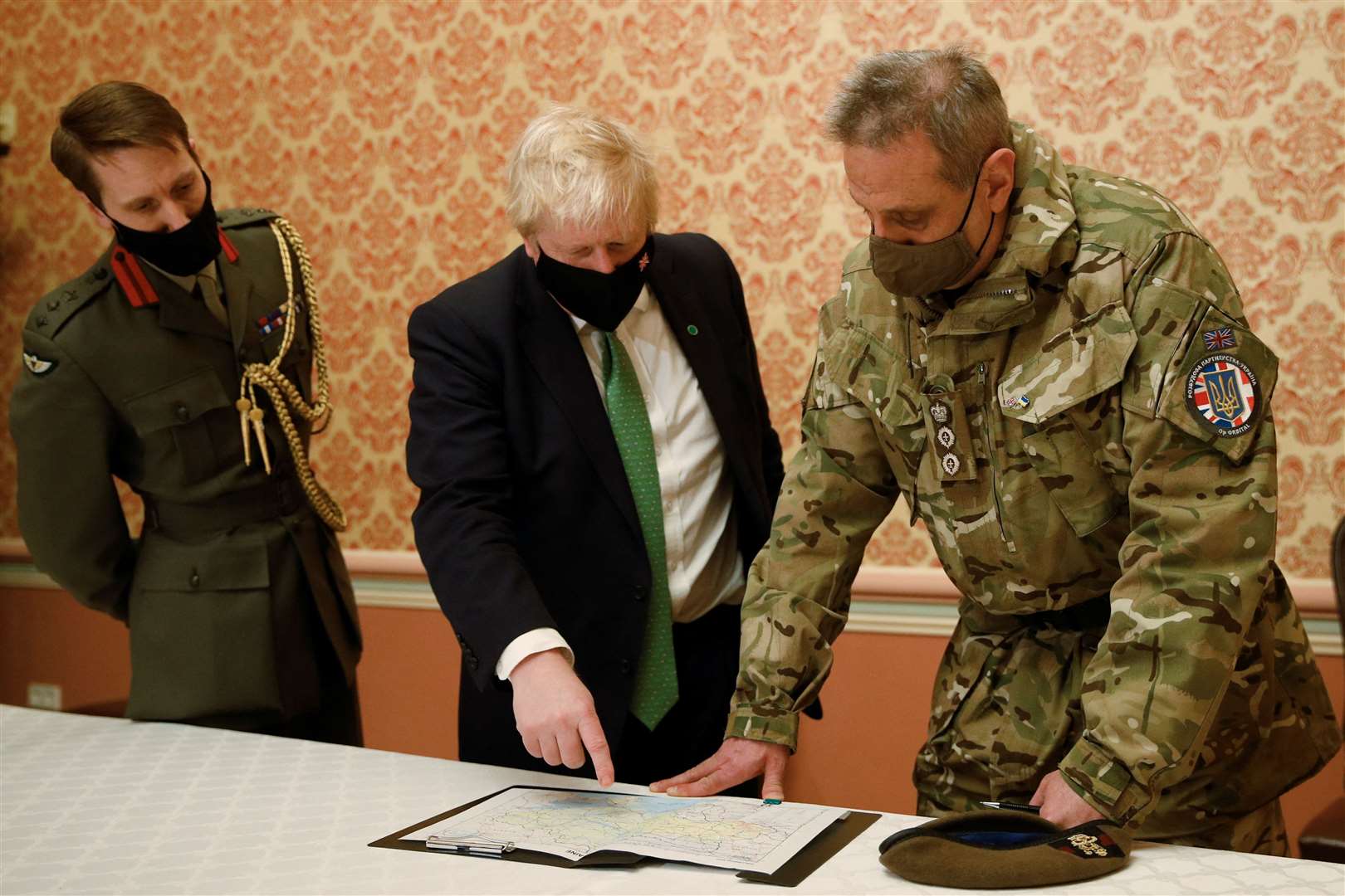 Prime Minister Boris Johnson attends a briefing with Colonel James HF Thurstan, Commander of Operation Orbital in in Kyiv, Ukraine, on February 1 2022 (Peter Nicholls/PA)