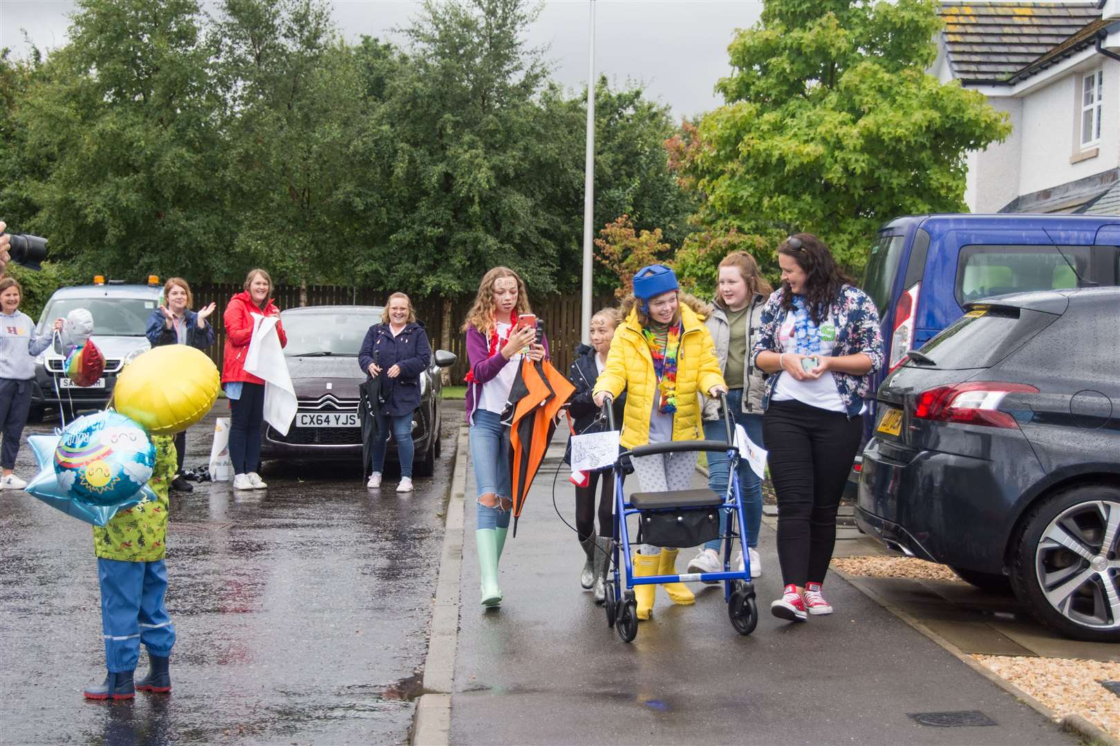 Ella Langdale completed the final two laps of her 100 lap walk around her block for CHAS, the charity who helps looks after her. ..Picture: Becky Saunderson..