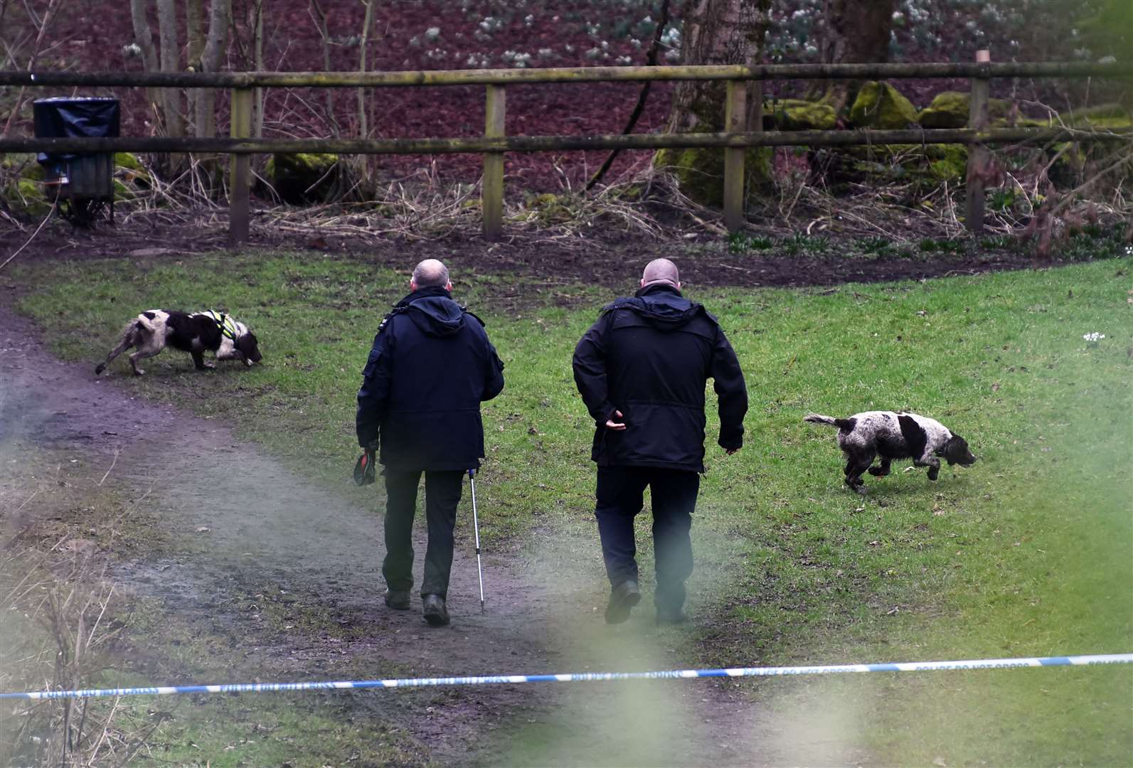 Police officers at the scene in Culcheth Linear Park near Warrington (PA)