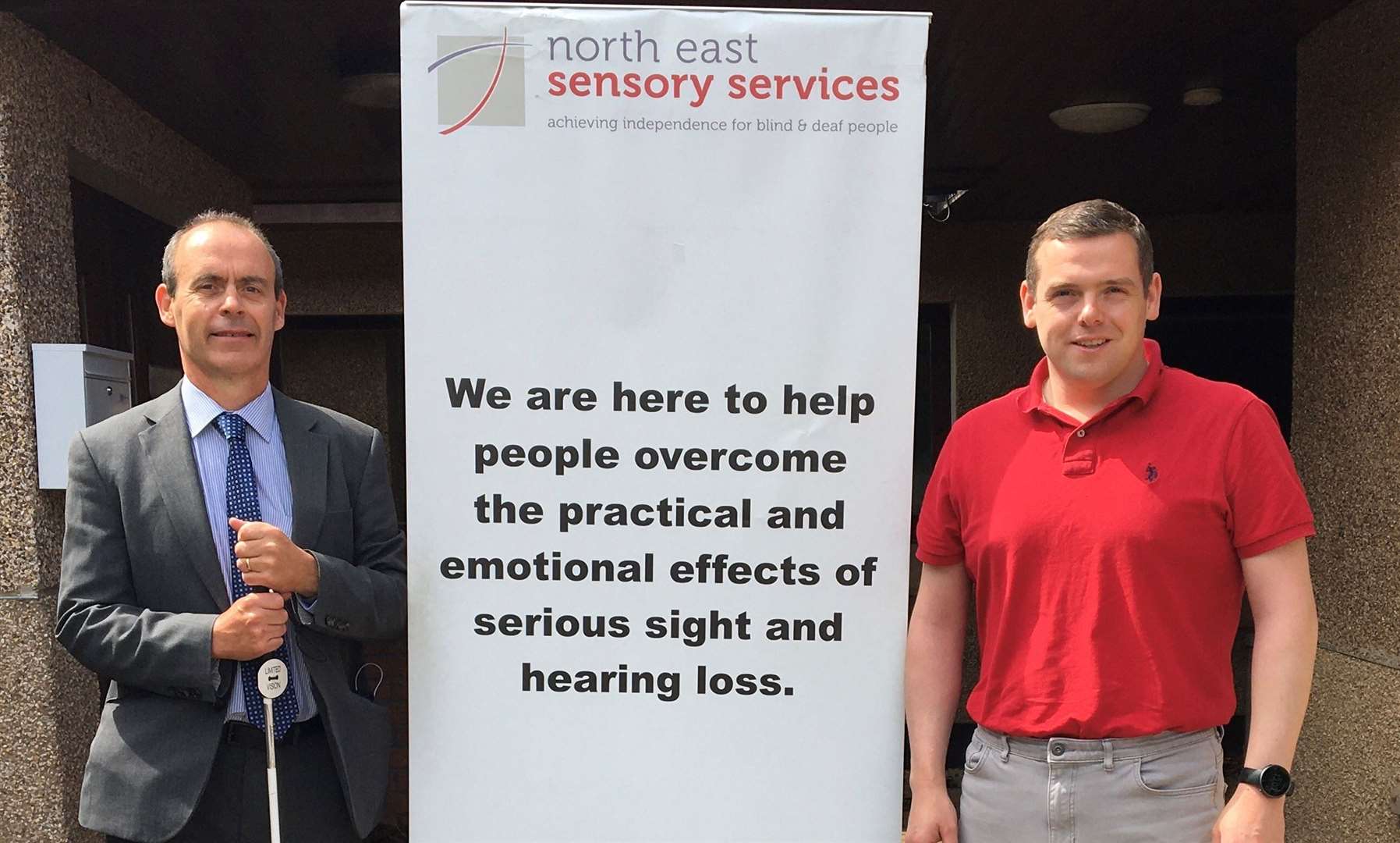 Douglas Ross MP (right) with the chief executive of the North East Sensory Services, Graham Findlay, following their meeting in Elgin. Picture: Moray Conservatives