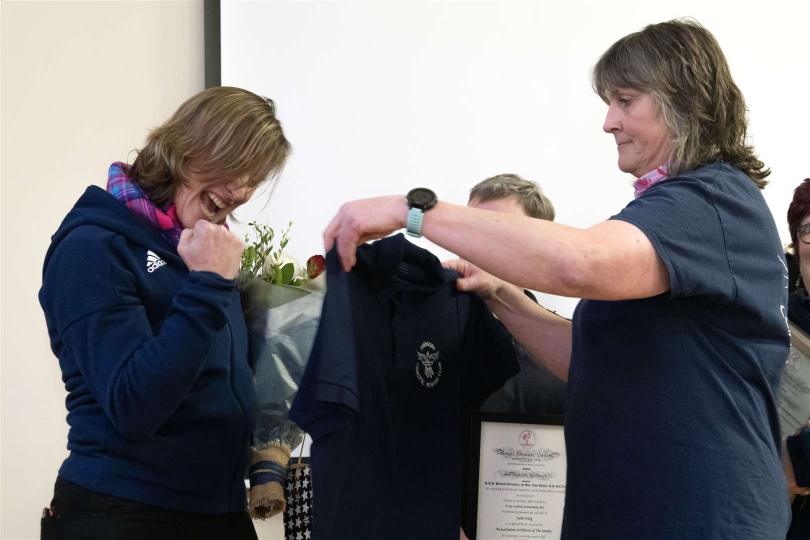 Dame Katherine Granger receiving a Findhorn Coastal Rowing Club t-shirt from Claire Weller. Picture: Beth Taylor