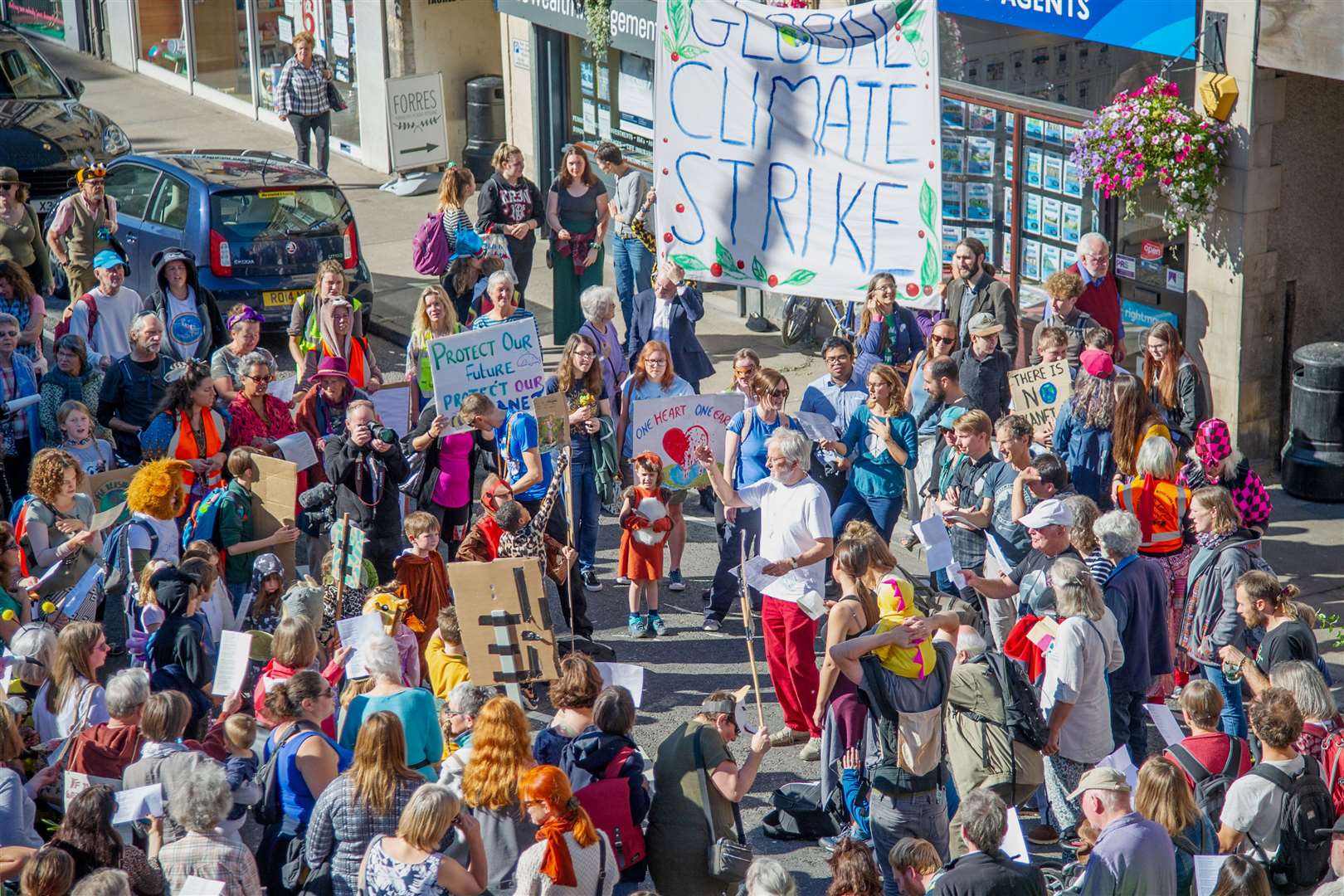 Protesters on Forres High Street earlier this year marching against the lack of action on climate change.