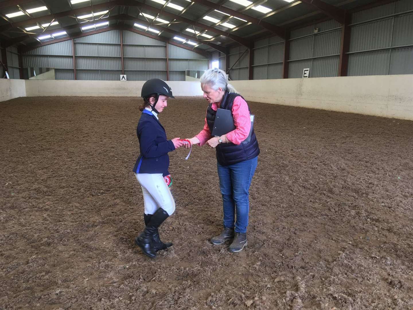Barabra Manson, Grampian and Highland Regional Chair, presents Kyla with a prize.