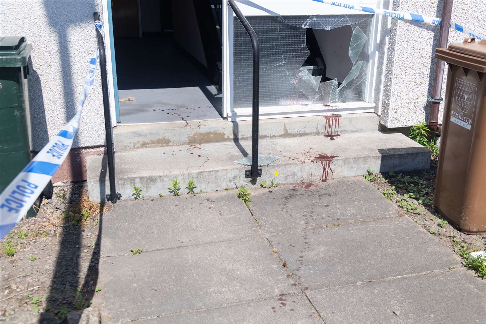 Blood on the concrete outside the home that police were called to...Picture: Beth Taylor.