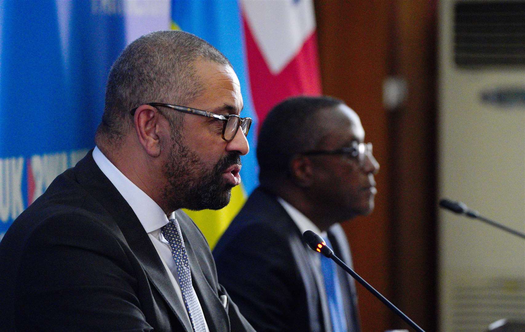 Home Secretary James Cleverly speaks during a press conference with Rwandan minister of foreign affairs Vincent Biruta (Ben Birchall/PA)