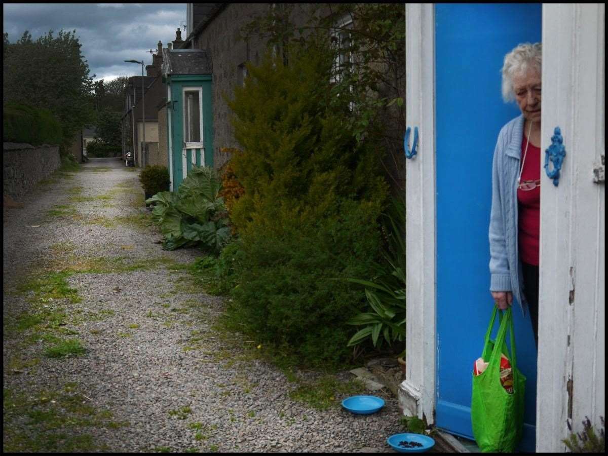 Old lady at door: Galen Sarab (15), Aberlour.