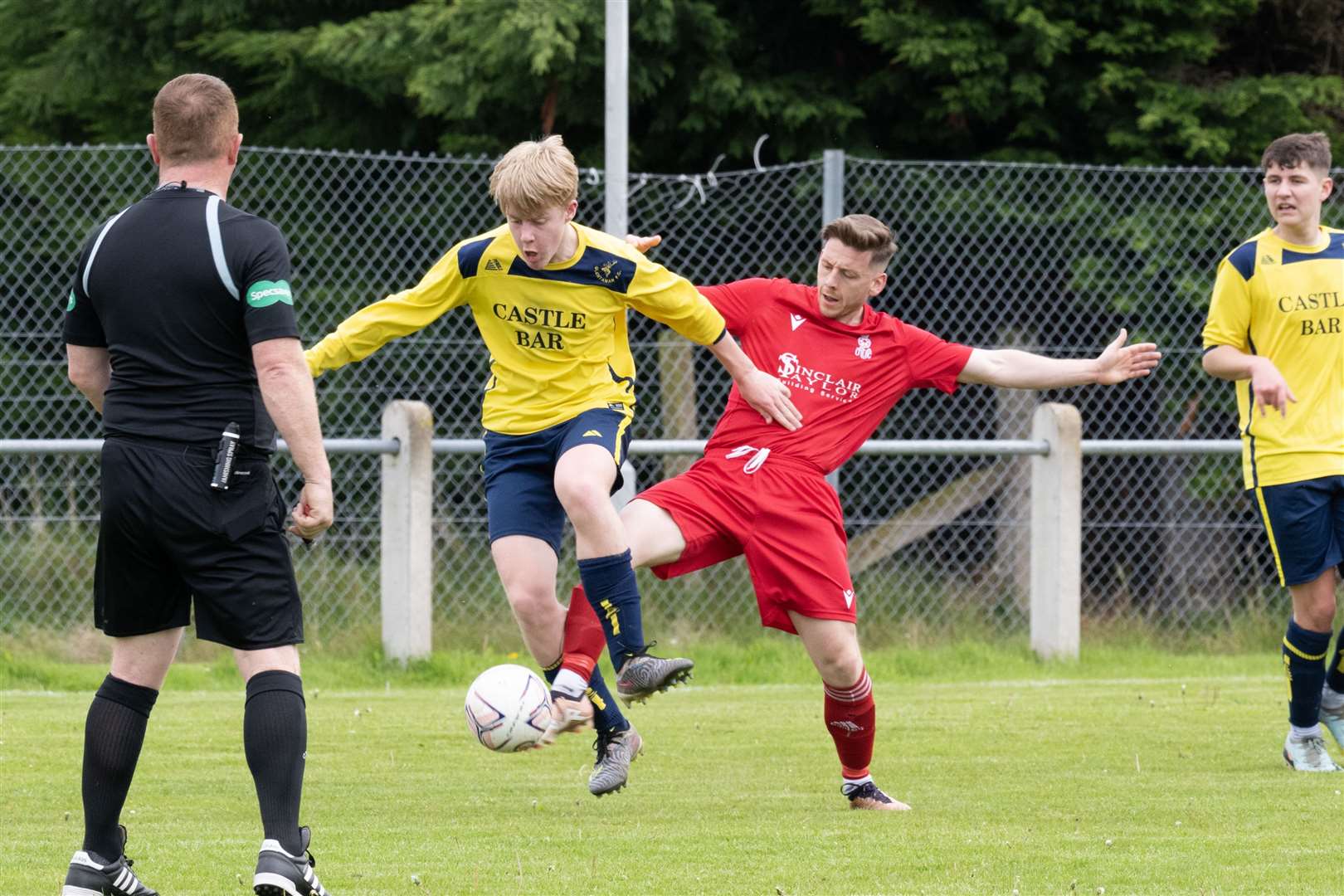 Forres Thistle's Neil Moir in action against Glentanar's Finlay Murray. Picture: Beth Taylor