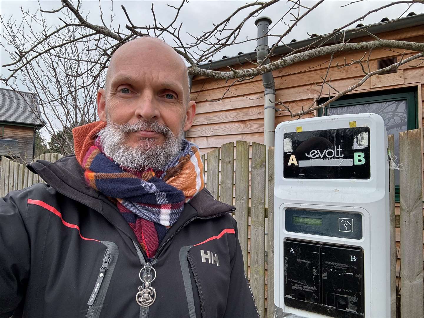 Councillor van der Horn at an EV charging point at The Park, Findhorn.