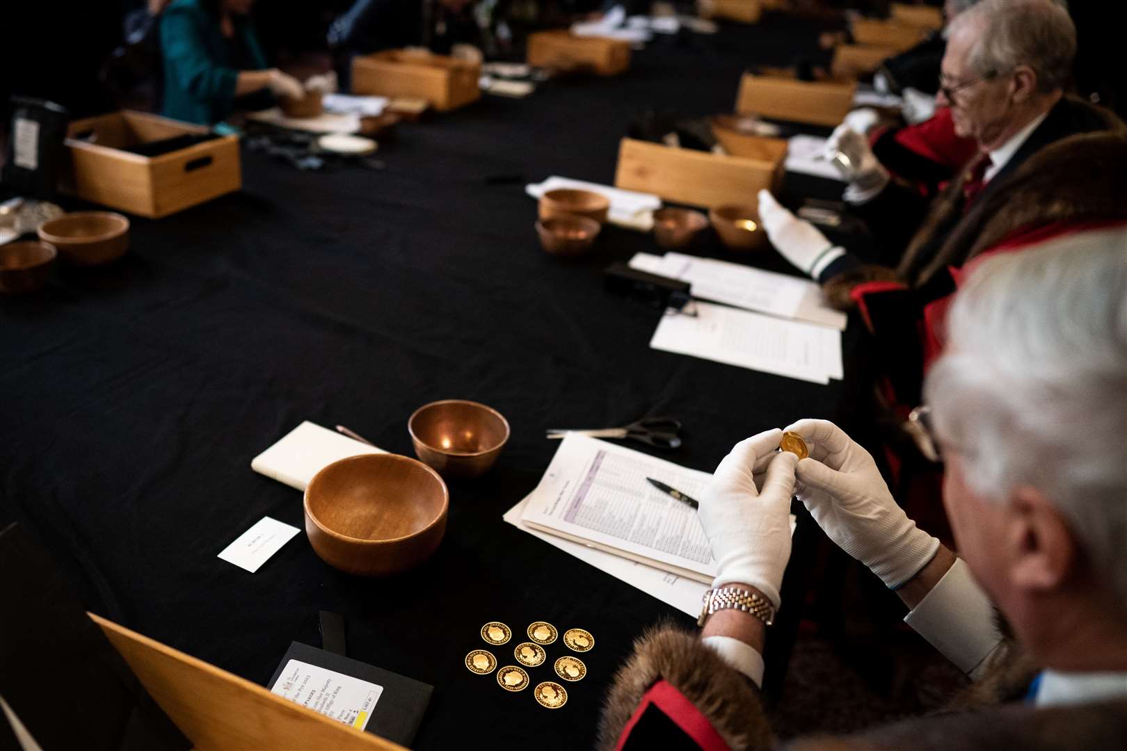 Coins are assessed at Goldsmiths’ Hall in London (Aaron Chown/PA)