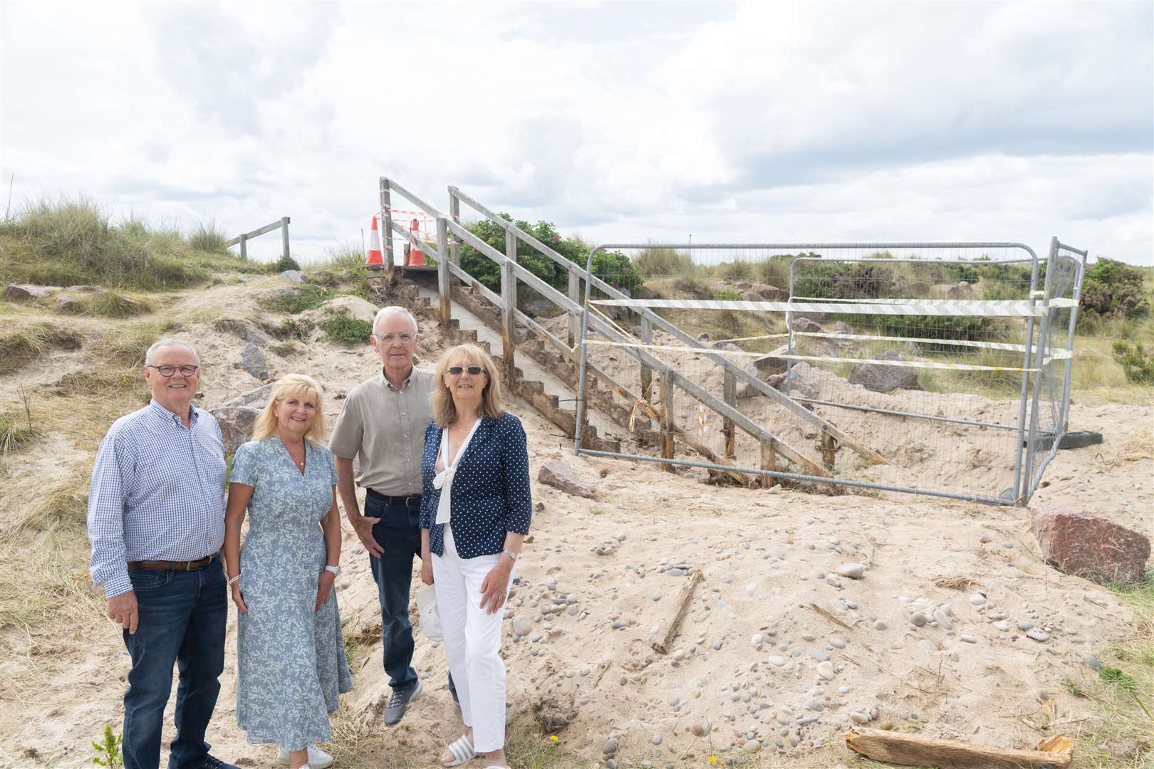The Budge Foundation founders Bill and Lorraine Budge with co-opted director from Findhorn Residents' Association Sam Russell and chairwoman of Findhorn Village Conservation Comapny Christine Hunt at new steps to the beach.