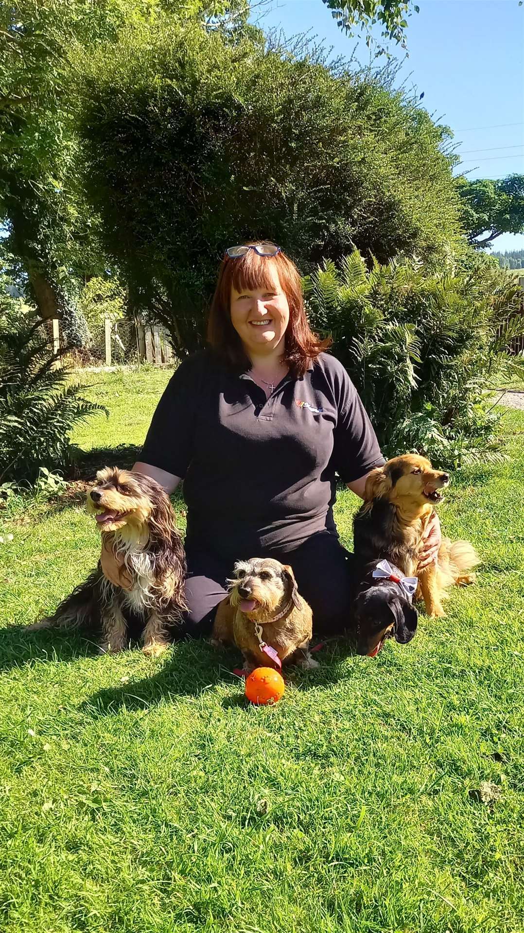 Julie McMillan, from Burgie, with three of her rescue dogs.
