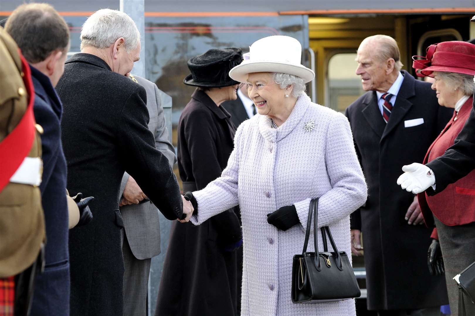 Arriving in Elgin by train in November 2014 alongside her late husband. Picture: Daniel Forsyth.