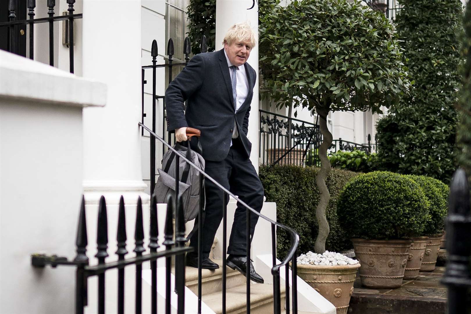 Former prime minister Boris Johnson leaves his home in London on Tuesday (Aaron Chown/PA)