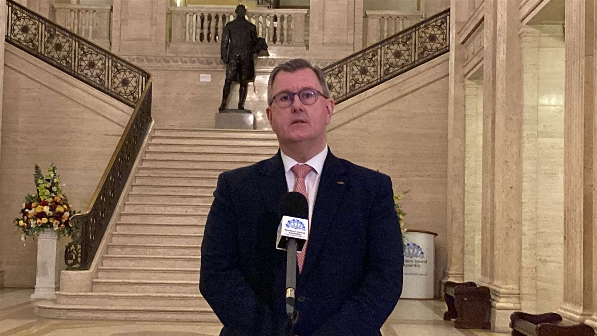DUP leader Sir Jeffrey Donaldson speaks to media in the Great Hall at Stormont following the shooting of an off-duty police officer in Co Tyrone (Rebecca Black/PA)