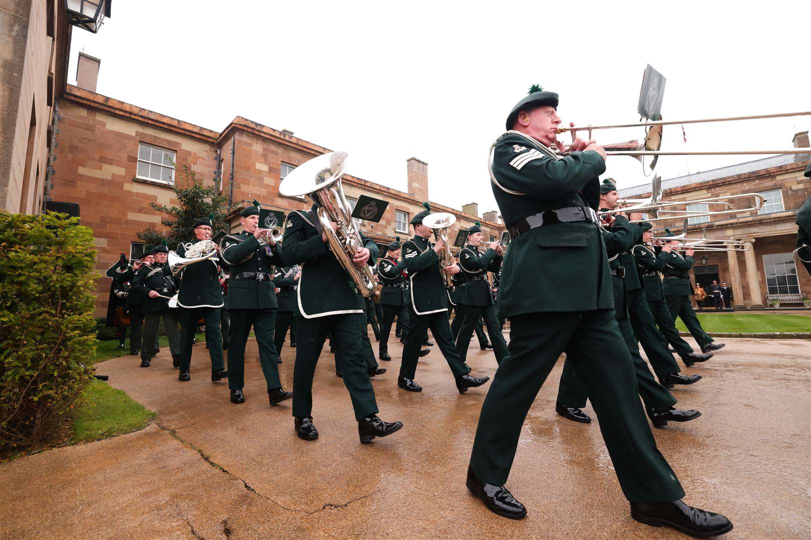 The Royal Irish Regiment (RIR) band led a procession of a Proclamation Guard from the 2nd Battalion of the RIR (Kelvin Boyes/PA)