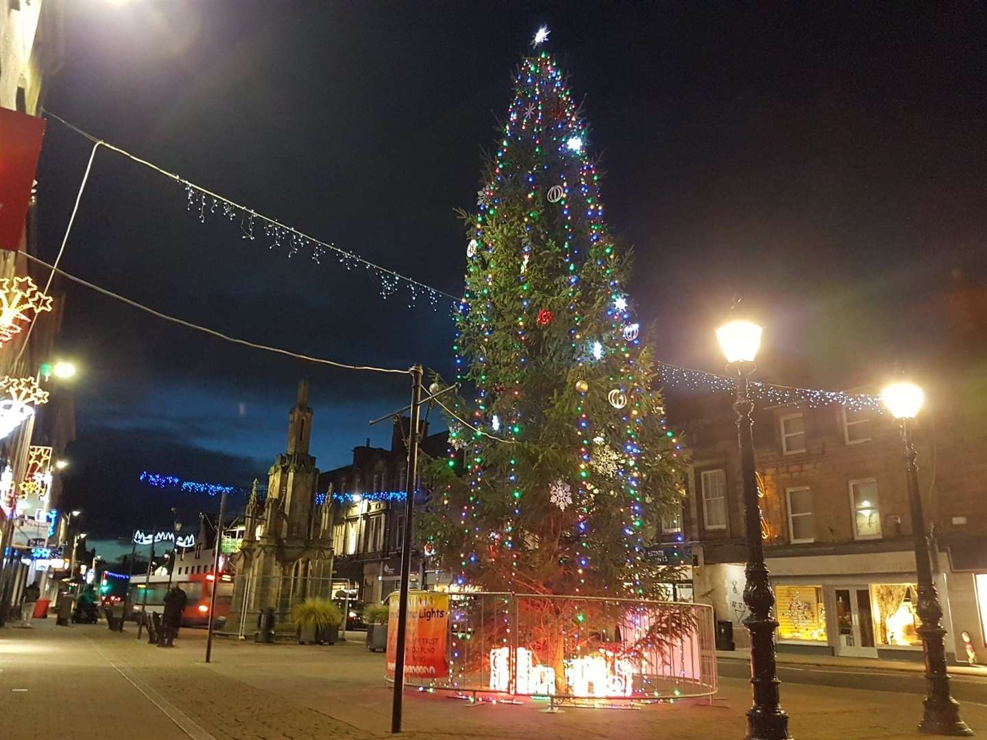 The tree and the Mercat Cross at the heart of Forres.