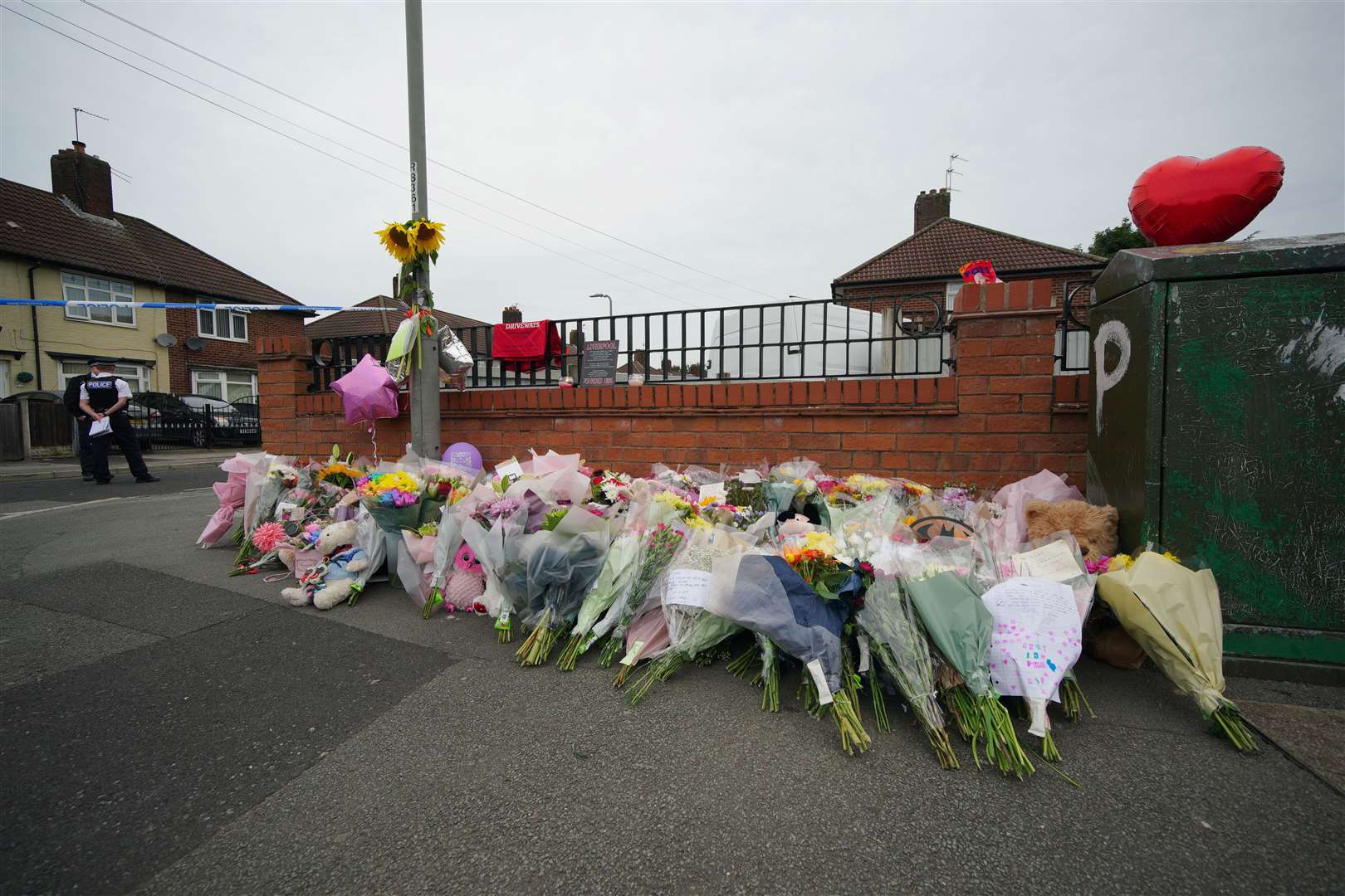 Flowers are left near to the scene of Olivia Pratt-Korbel’s death (PA)