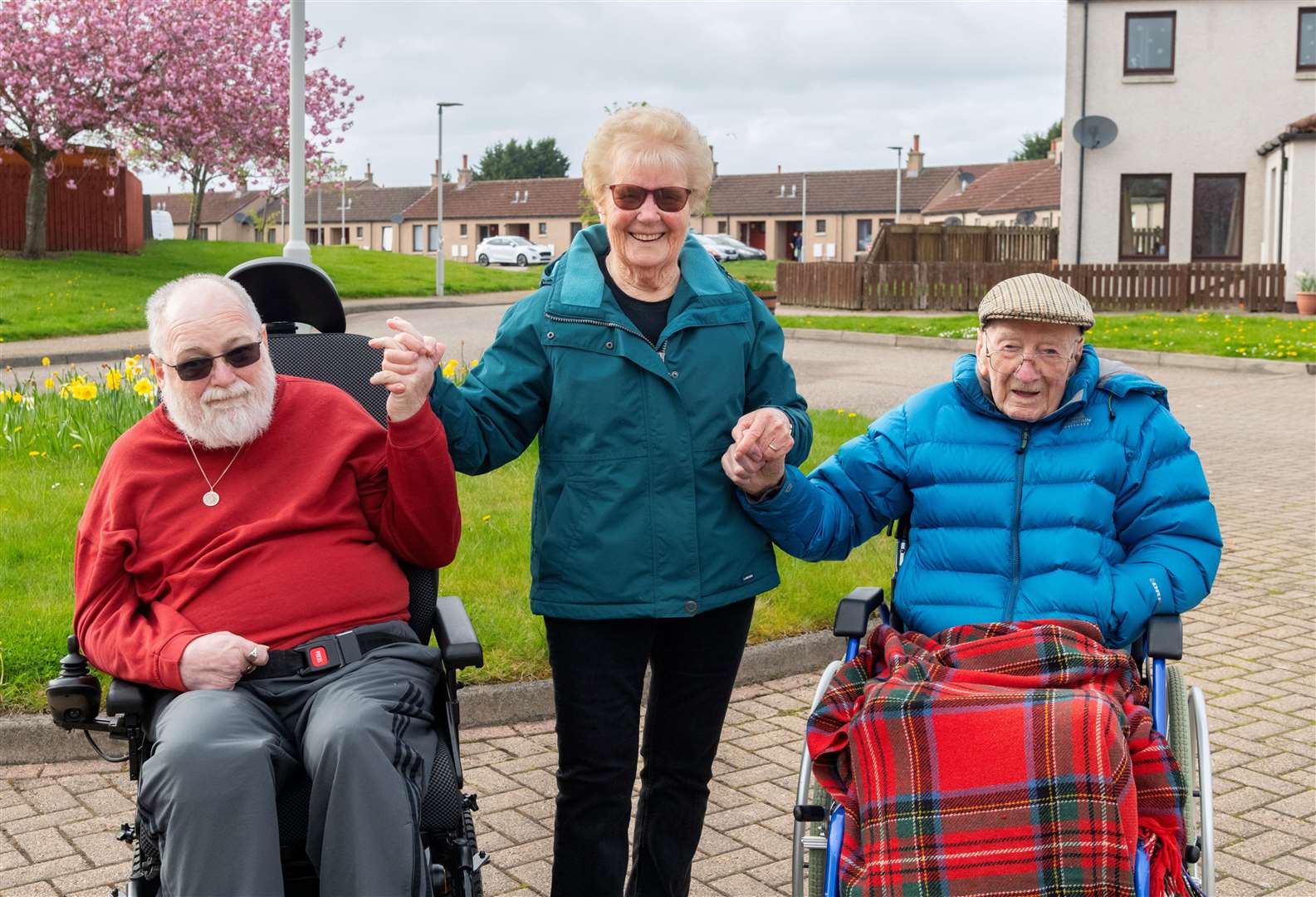 From left: Jim Bremner, Dot Bremner and Alan Walker are calling for more wheelchair-accessible taxis in Moray. Picture: Beth Taylor