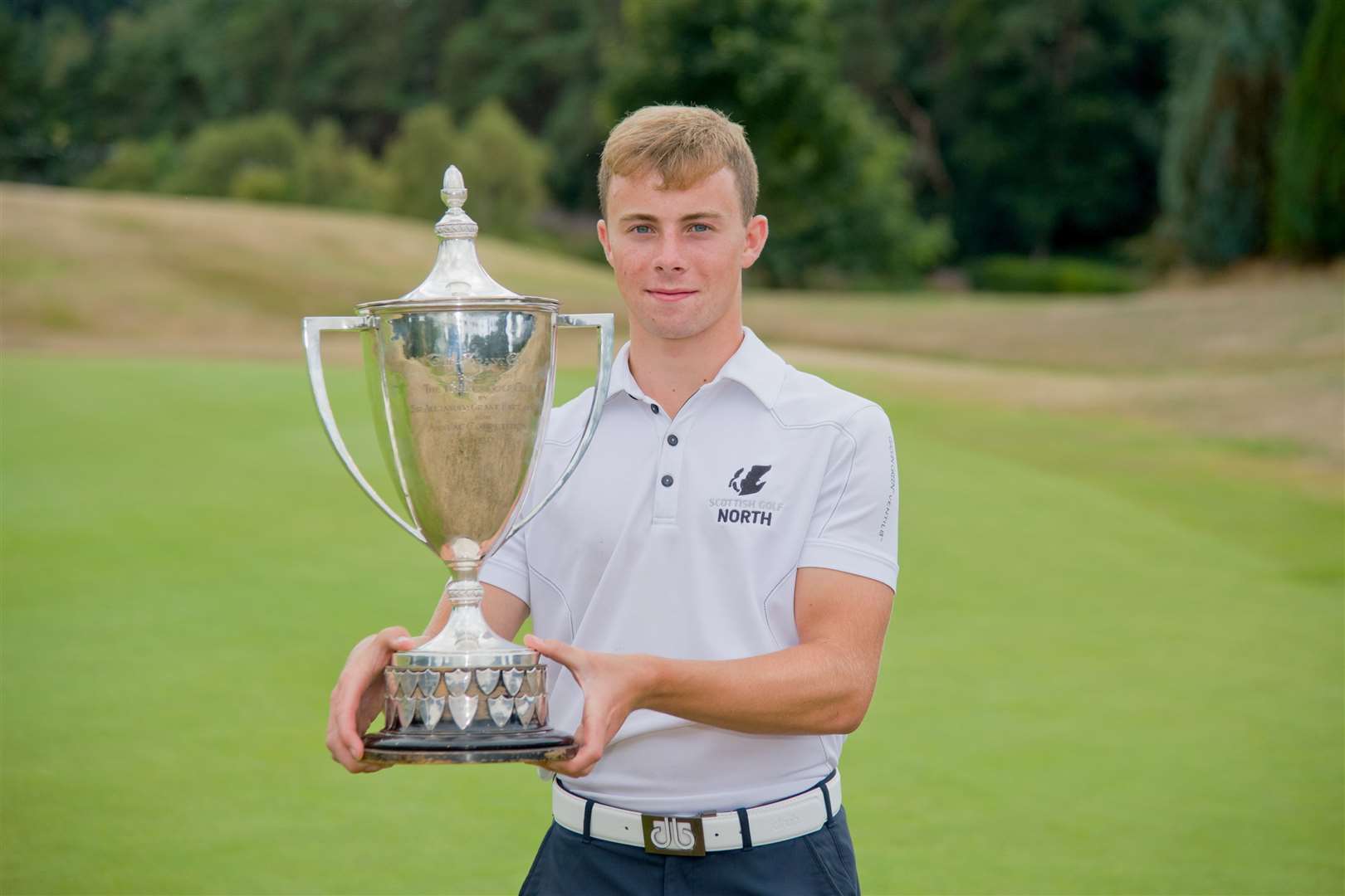 Pictured with the Forres five-day open scratch trophy in 2018, Matty Wilson is the new Northern Amateur Championship winner. Photo: Daniel Forsyth.