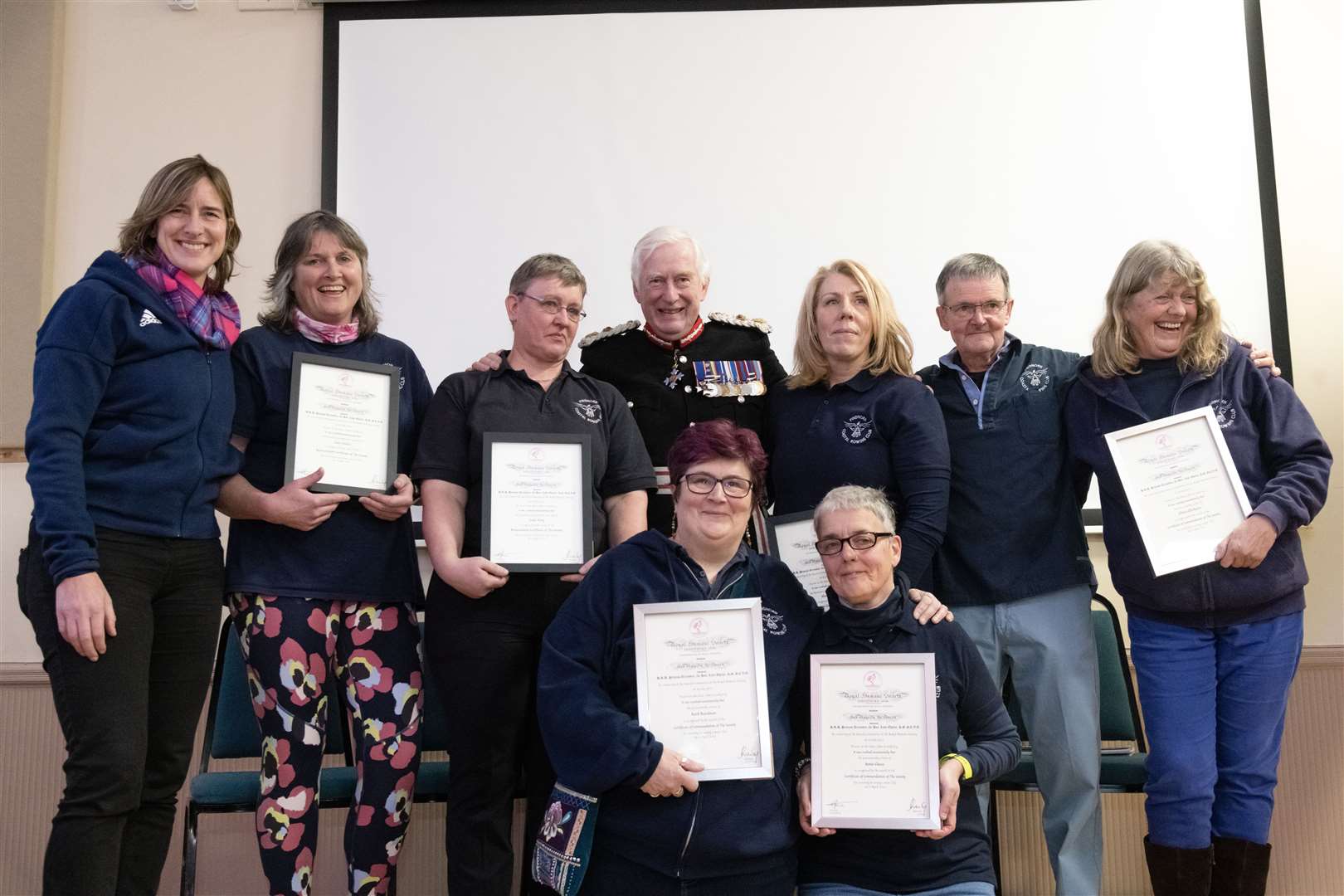 Dame Katherine Granger (left) and Lord-Lieutenant of Moray, Major General Seymour Monro (centre) presented Certificates of Commendation and Resuscitation Certificates to the Findhorn Coastal Rowing Club. Picture: Beth Taylor