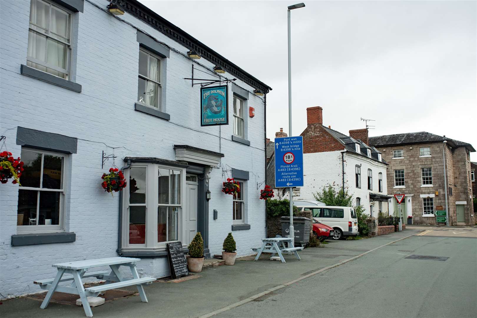 The Dolphin, in Wales, (L) and the Cross Keys, in England (R) (Jacob King/PA)