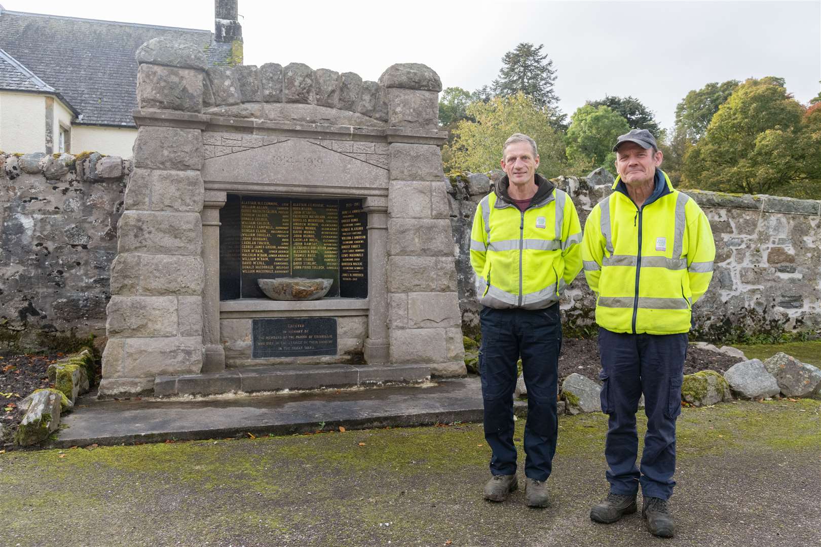 Moray Council employees Lindsay Grant and Steve McDermot maintain Edinkillie War Memorial. Picture: Beth Taylor