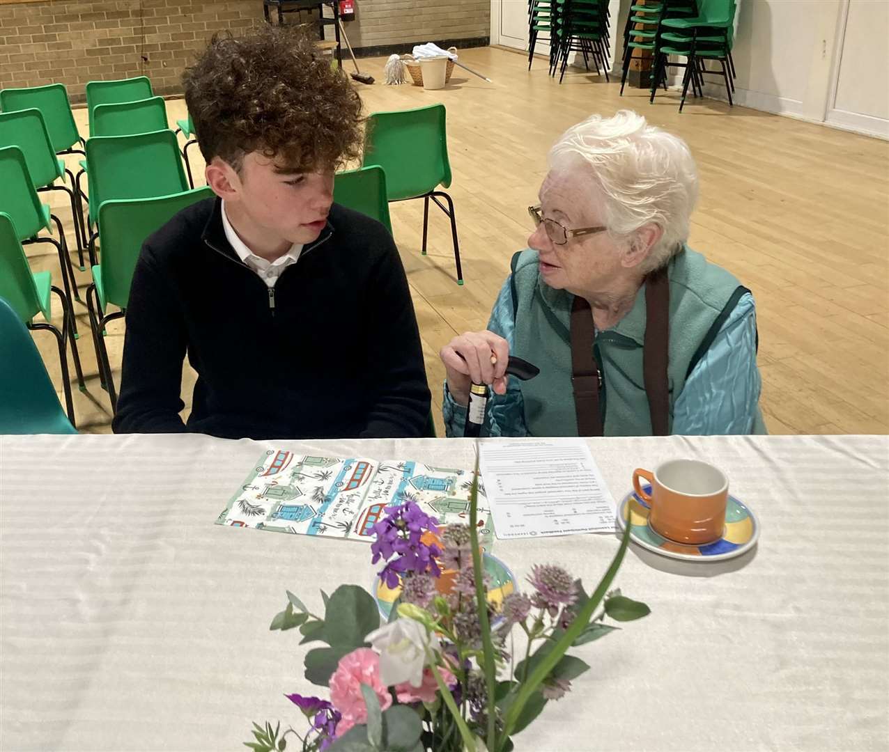 Former Leanchoil midwife nurse Margaret Watson (right) was interviewed by 4th year pupil Bill Symon at Forres Academy during a Memory Tea as part of the Our Leanchoil project.