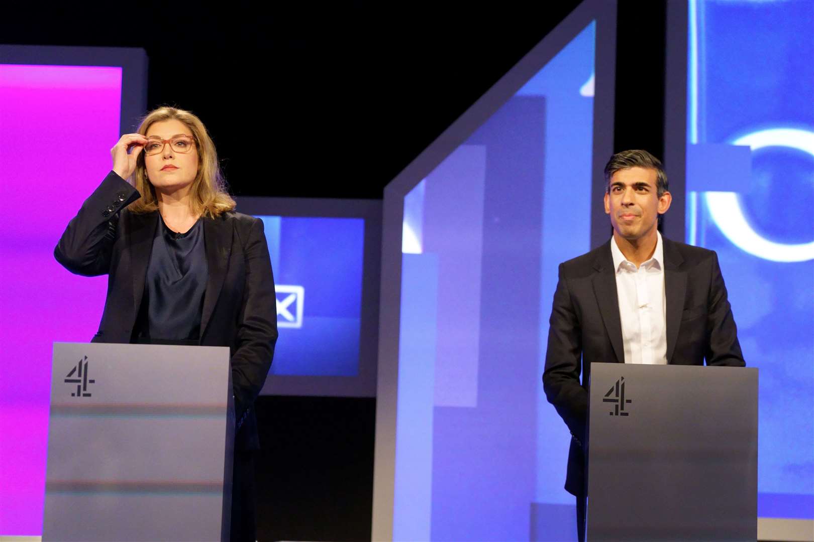 Penny Mordaunt and Rishi Sunak who clashed over tax in the leadership debate (Victoria Jones/PA)