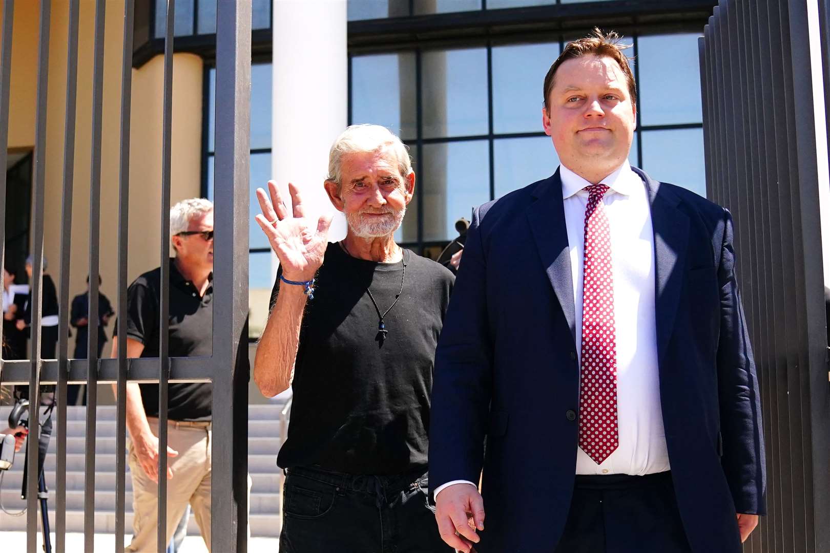 David Hunter (left) with Michael Polak, director of Justice Abroad, leaves Paphos District Court after he was released from custody by Cypriot prison authorities (Victoria Jones/PA)
