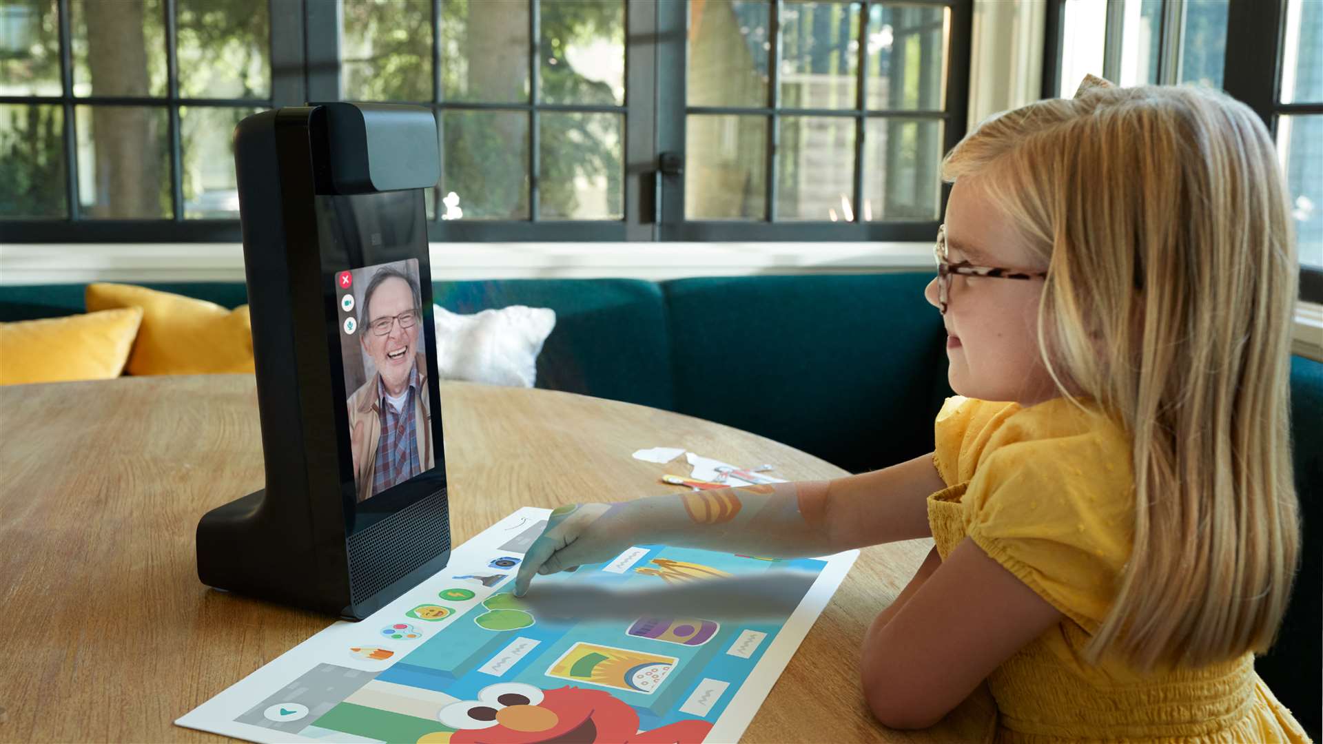 The Amazon Glow includes projected tabletop activities for children to do while on calls with family (Amazon/PA)