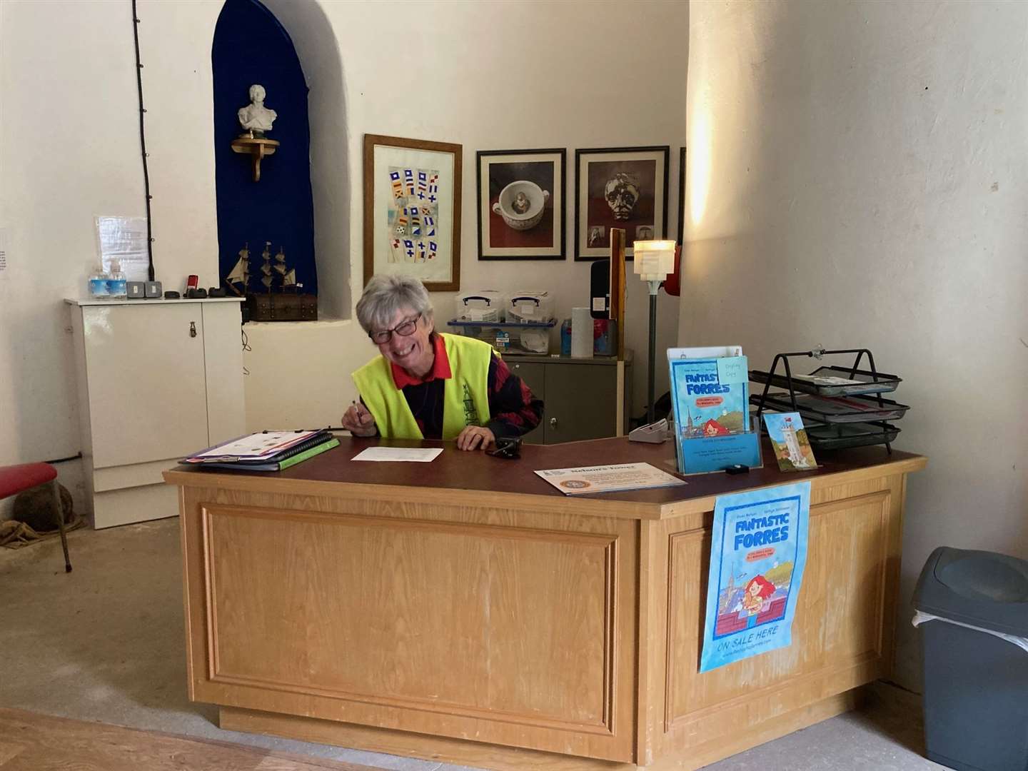 A volunteer ready to welcome visitors to Nelson's Tower.