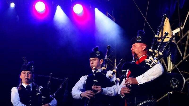 Lily Carmichael, Lewis Mcnish and Pipe Major Johnathan Scott during the performance.