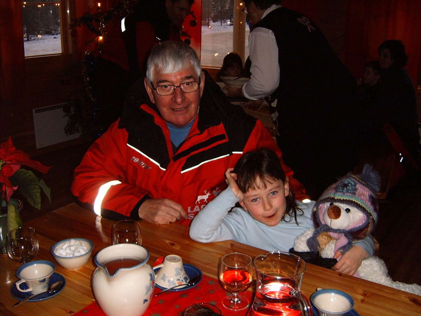 Jenna Rattray with her late granda, former Burghead police officer Alan Rattray, on a Christmas trip to Lapland back in 2006.
