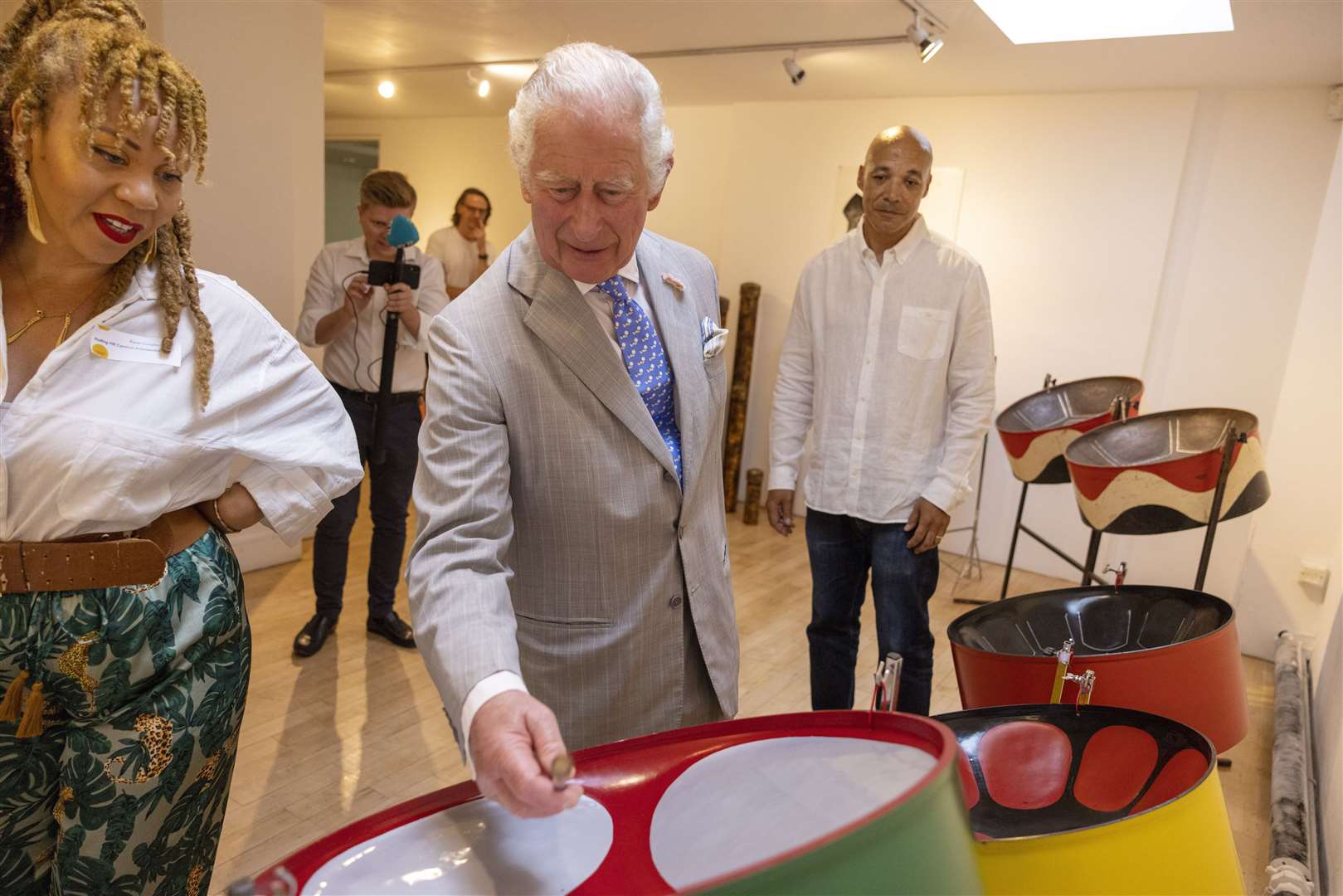 The Prince of Wales could not resist trying to play a steel pan (Ian Vogler/Daily Mirror/PA)