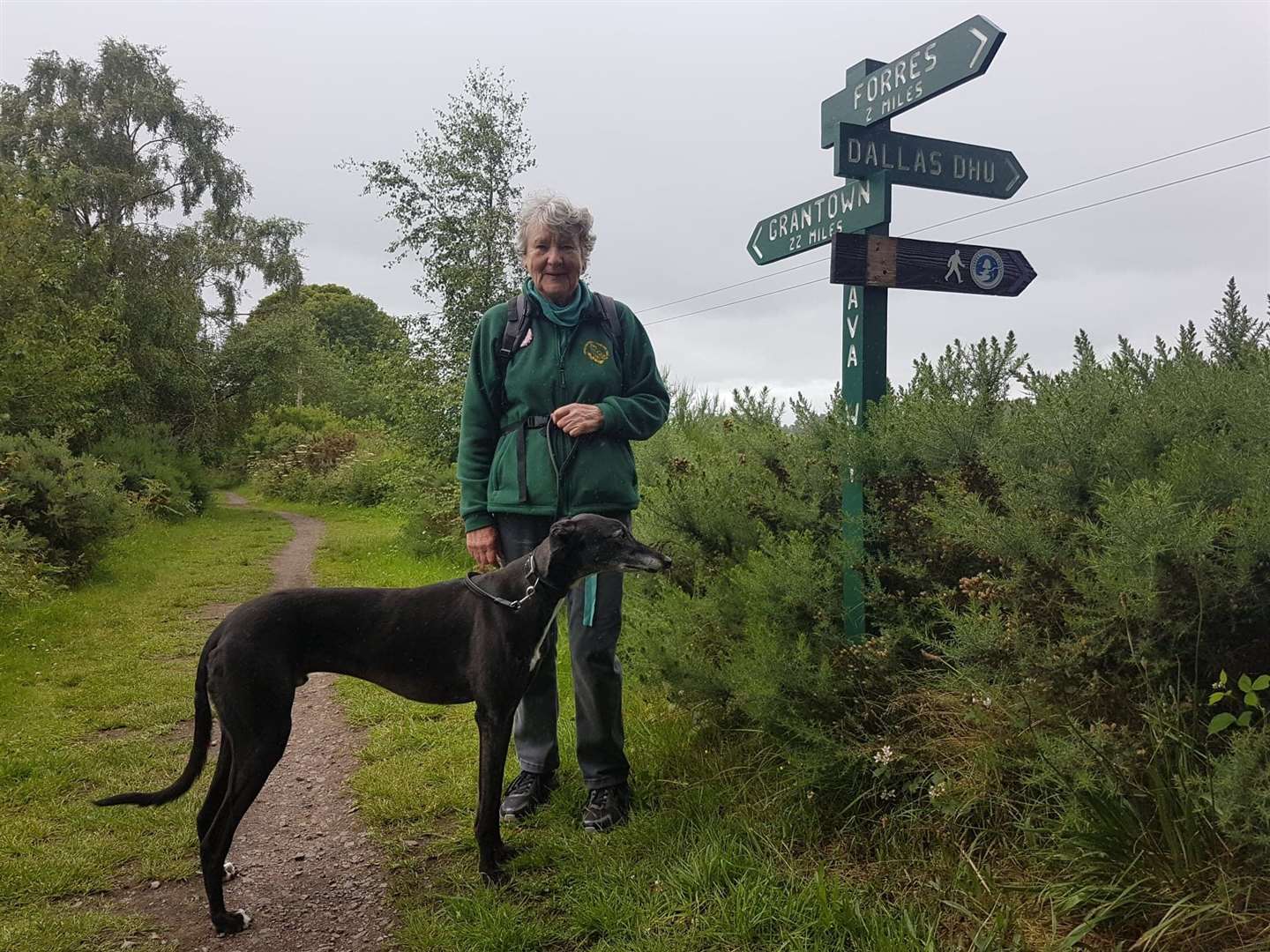 Marie Jacques and Ziggy at thestart of the Dava Way by DallasDhu Distillery.
