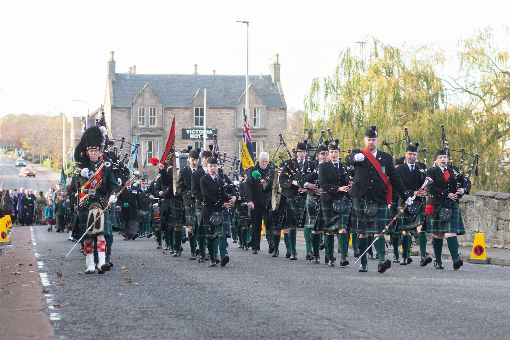 Forres and District Pipe Band leading the Remembrance procession back through High Street last year.