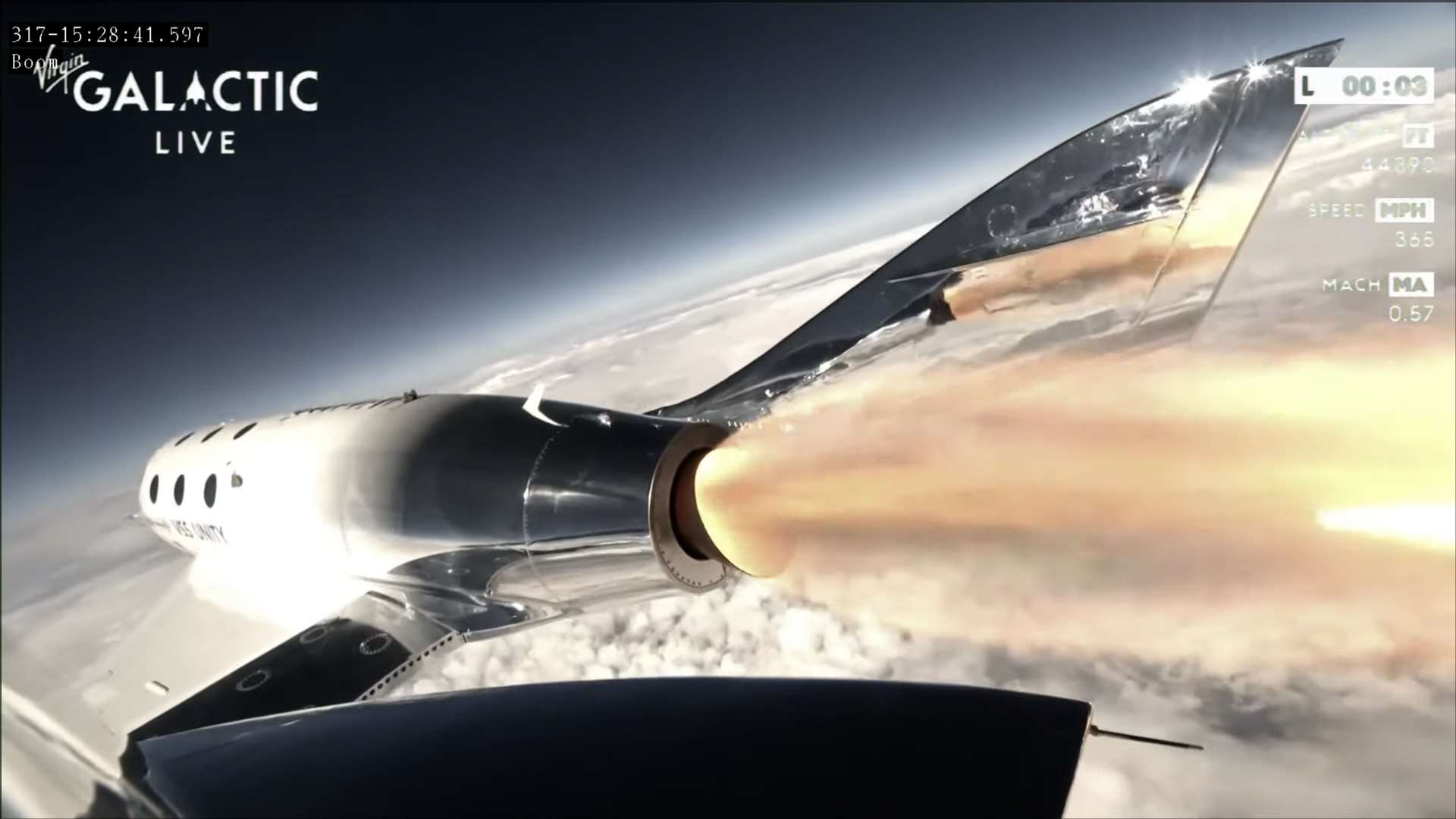 Virgin Galactic’s rocket plane ignites as it blasts off to the edge of space on June 29, the company’s first commercial space flight (Virgin Galactic/PA)