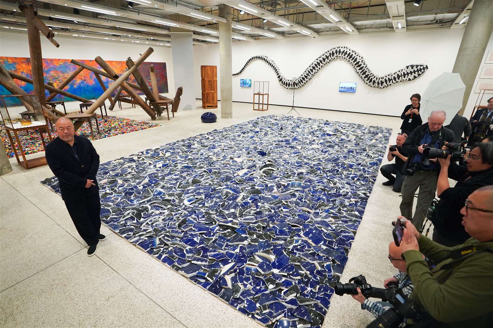 Ai Weiwei’s broken pottery artwork lies on the ground of the Design Museum in London (James Manning/PA)
