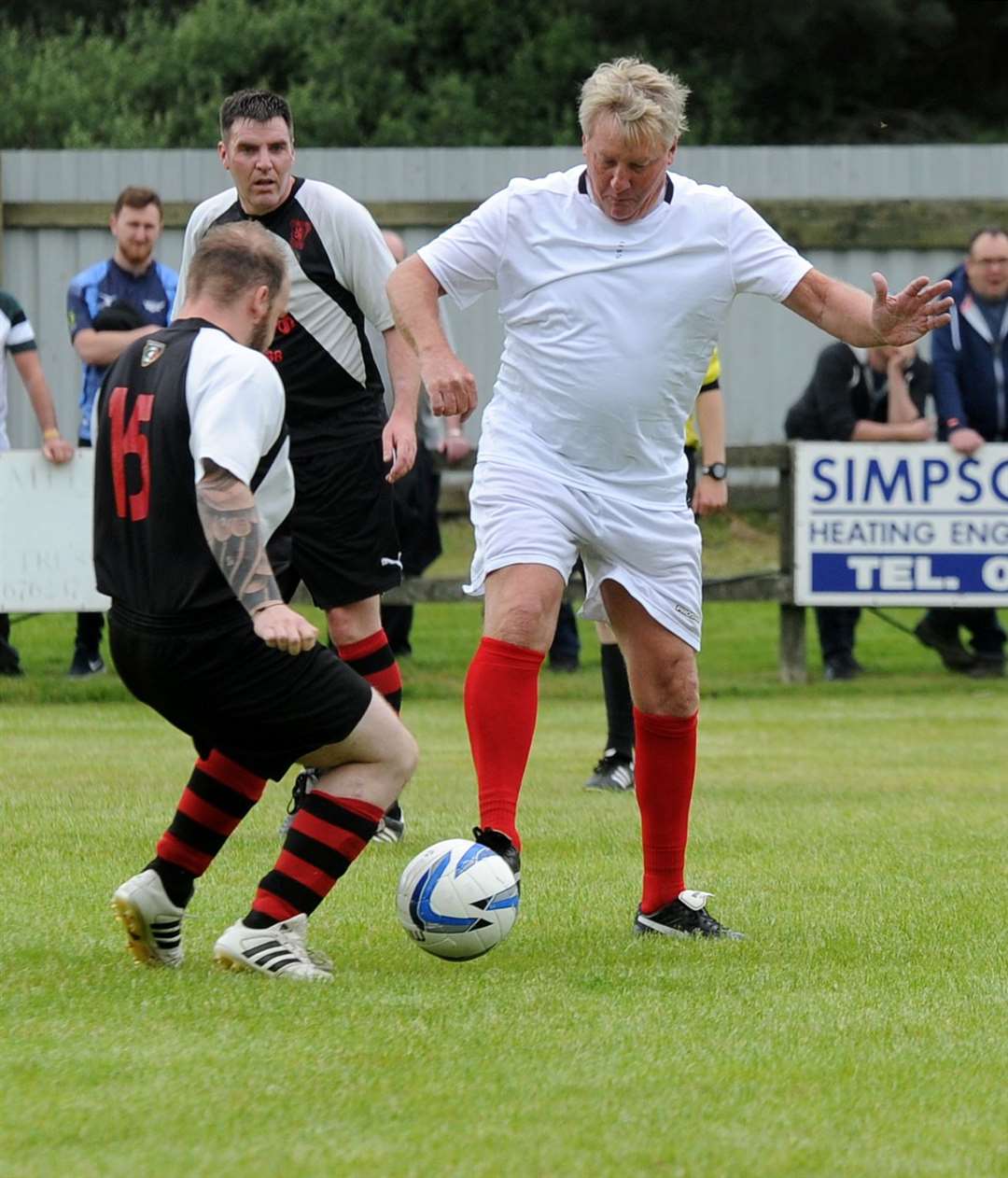 Frank McAvennie played for an Old Firm Legends team against Elgin Albion in Burghead in recent years.