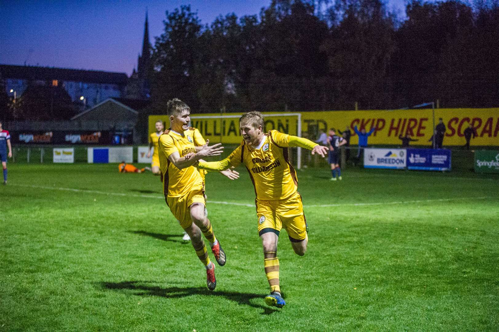 Robbie Duncanson (right) charges towards the home dugout to celebrate his winning goal alongside Owen Paterson (left). Forres Mechanics v Turriff United at Mosset Park...Picture: Becky Saunderson..