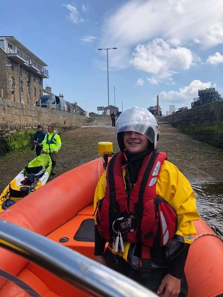 Newest MIRO recruit Jamie Paterson is all smiles after returning a kayak to Burghead Harbour.
