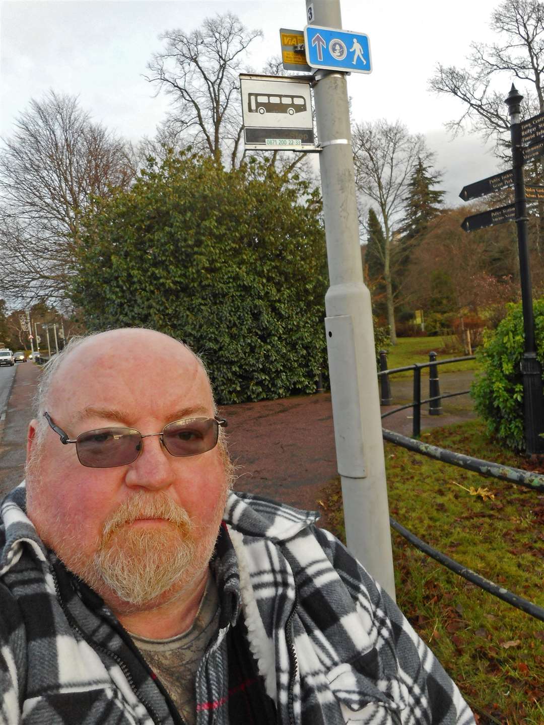 Community councillor and wheelchair user Ken Shand at the new bus stop on Victoria Road.