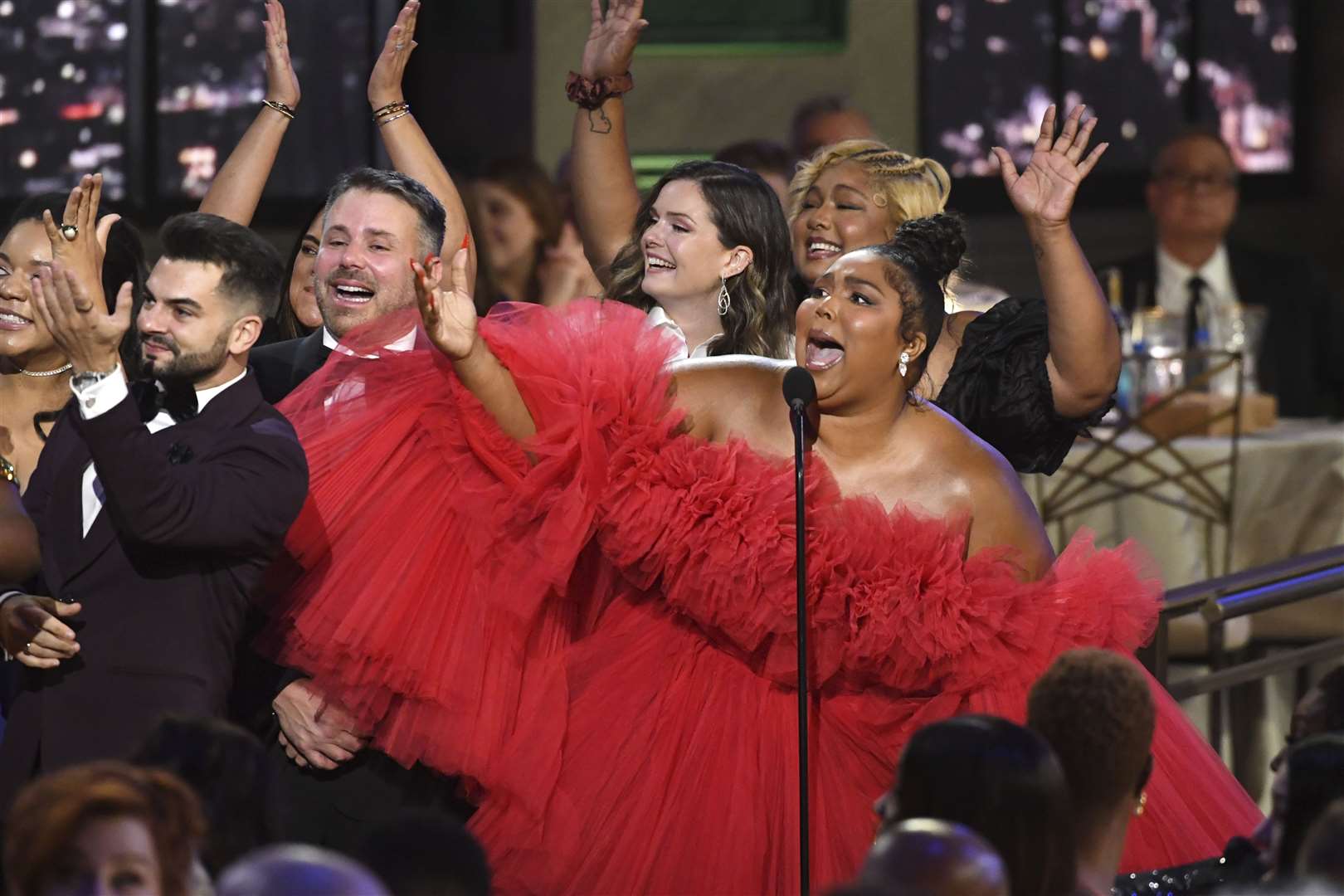 Pop megastar Lizzo later gave an emotional speech on representation, after winning the Emmy for best competition series (Phil McCarten/AP)