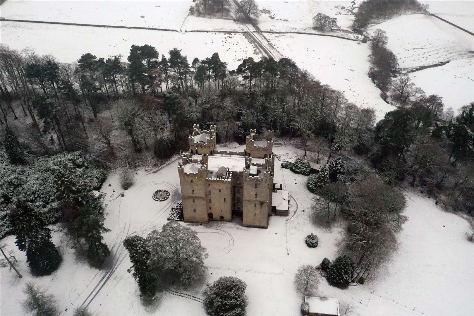 Snow covers the grounds surrounding Langley Castle Hotel near Haydon Bridge, Northumberland, a medieval tower house built in the 14th century (Owen Humphreys/PA)