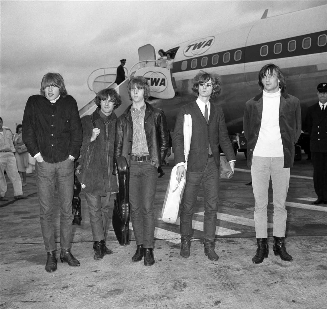 The Byrds arriving in London for their UK tour, featuring bandmembers Mike Clarke, Chris Hillman, David Crosby (centre), Jim McGuinn and Gene Clark (PA Archive/PA Images)