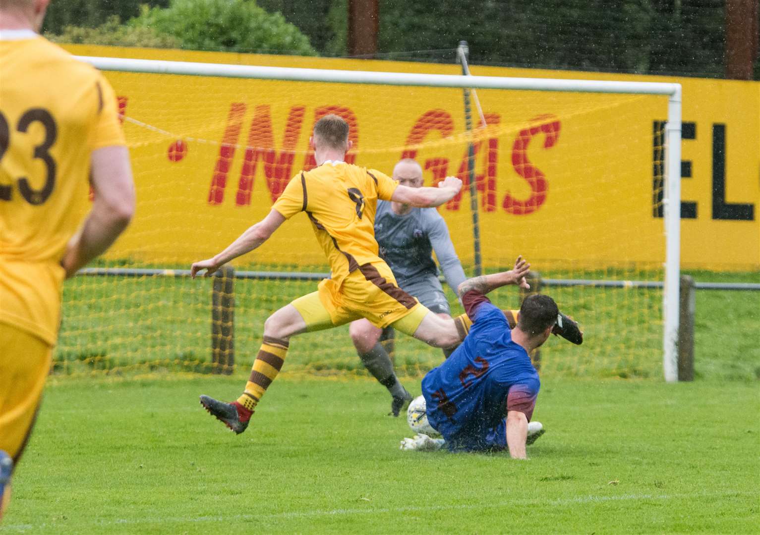 Marc Young gives away a penalty with this challenge on Jordan Milne. Picture: Becky Saunderson. Image No.044665.