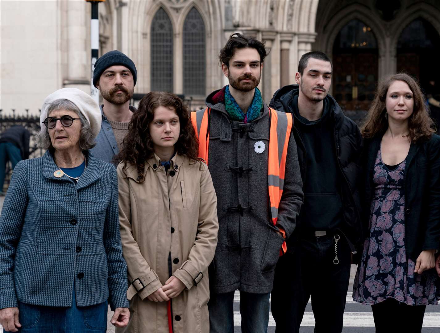 Just Stop Oil protester Gaie Delap (far left) stands with others outside the Royal Courts of Justice (Aaron Chown/PA)