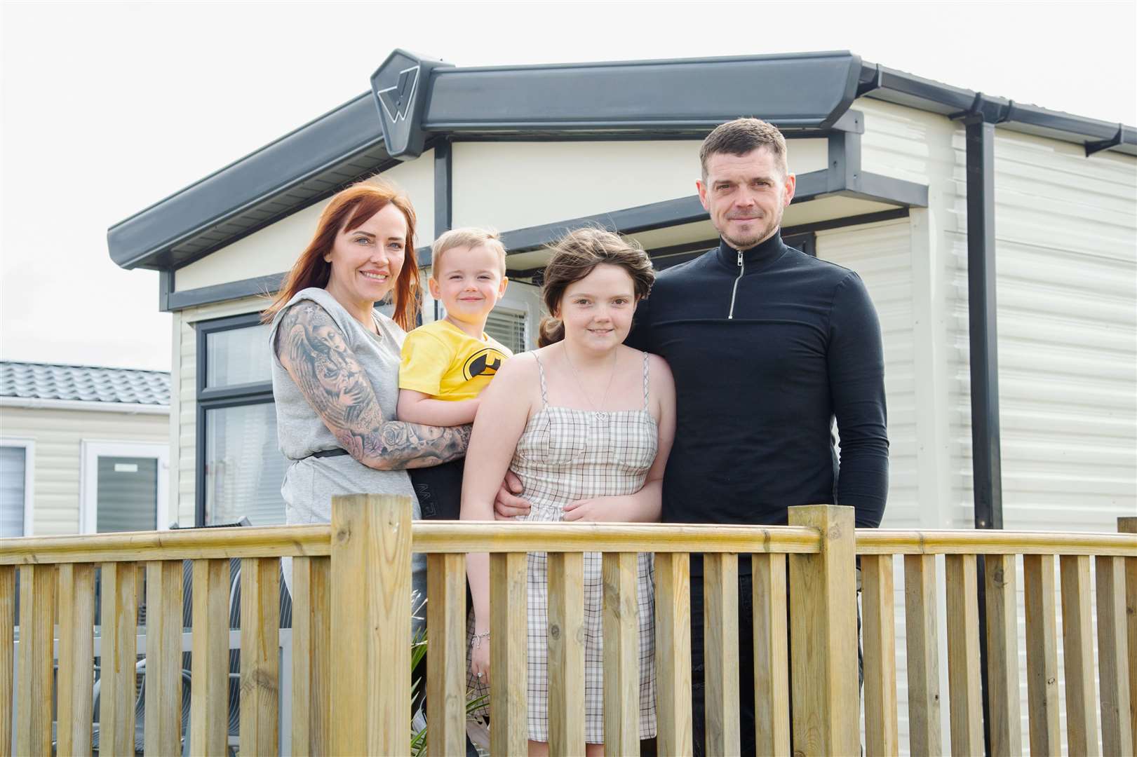 Logan's Fund last week reopened its Sunny Days holiday home in Lossiemouth to welcome Rutherglen family Kaiann Macallister, brother Karsson, mum Sharon and dad Mark. Picture: Daniel Forsyth.