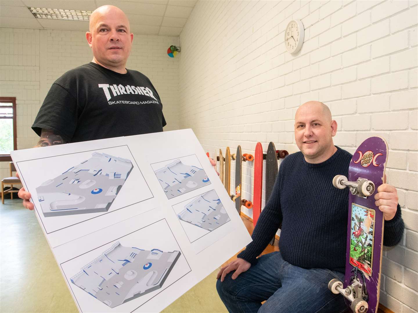 FSPI treasurer Nikk Horne (left) and Shaun Moat showing an artist's impression of Forres skate park.
